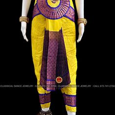 Design by Classical Dance Jewelry® ❥ Traditional Bharatanatyam costume wore during regular dance programs or arrangetram performance. ❥ Material : Art Silk ❥ Type : Traditional pant costume ❥ Easy to wear ❥ layer front fan ❥❥❥❥ 32 inch PANT LENGTH Dress Measurements ( all the measurements approximately 1 -2 margin buffer) Age: 9 - 12 yrs ❥ PANT MEASUREMENTS: ☛ Pant Length: 31-32 inch ☛ Pant Waist: 29-30 inch ☛ Pant Hip: 30-31 ❥ BLOUSE MEASUREMENTS: ☛ Blouse length: 11-12 inch ☛ Blouse Shoulder : Yellow Bollywood Churidar For Puja, Traditional Churidar For Navratri, Traditional Patterned Churidar For Puja And Navratri, Traditional Patterned Churidar For Puja During Navratri, Traditional Churidar For Puja During Navratri, Traditional Drape Churidar With Traditional Patterns For Festivals, Traditional Drape Churidar With Patterns For Puja, Traditional Drape Churidar With Traditional Patterns For Puja, Traditional Multicolor Churidar For Puja