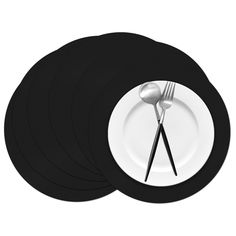 four black placemats with forks and spoons on them, set against a white background