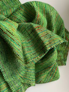 Stay warm and stylish with our handwoven scarf, made from a luxurious blend of neon green merino wool and black bamboo. Measuring 12" wide and 72" long, with 2" long fringe, this scarf is the perfect size to wrap around your neck for added warmth and flair. Each scarf is handmade by skilled artisans, ensuring that no two are exactly alike. The intricate weave and bold neon green and black color combination make this scarf a true statement piece that will add a touch of sophistication to any outf Lime Green Printed Scarf, Black Color Combination, Handwoven Scarf, Black Bamboo, Long Fringe, Long Fringes, Handmade Charms, Black Wool, Color Combination