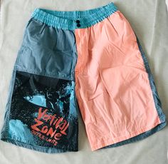 "Catch a wave with these 90's Vintage Swim trunks! Made in the USA, 100% cotton. Button and zip closure with an adjustable waist tie inside. Side pockets! Modeled on a small, size can be adjusted. (Full/unadjusted)Waist: 30\" Hip: 45\" Length: 42\"" Retro Surfing Bottoms For Summer, Beach Shorts With Adjustable Waist In Cotton, Cotton Beach Shorts With Adjustable Waist, Summer Cotton Surfing Bottoms, Cotton Bottoms For Surfing In Summer, Summer Surfing Cotton Bottoms, Cotton Beachwear Bottoms For Surfing, Casual Surfing Shorts With Pockets, Retro Cotton Bottoms For Beach Season