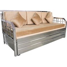 a metal frame couch with four pillows on it's back and two side rails