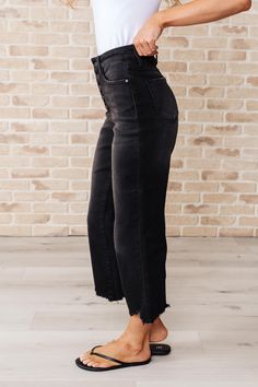 Get ready to rock stylishly with Ryan High Rise Jeans! These wide leg crop jeans feature a coordinating button fly and a washed out black garment dye for a cool, edgy look. With a high rise and raw hem, you'll stand out in the best way possible. **This item is a Drop Ship item which means it will ship from another facility. Estimated ship time is 8-10 business days to ship out. If you purchase multiple items you may receive them in multiple packages. Judy Blue High Rise Button Fly Garment Dyed W Skirt Jumpsuit, Judy Blue Jeans, Crop Jeans, Edgy Look, Sweater Blouse, High Rise Jeans, Cardigan Jacket, Cropped Jeans, Jumpsuit Dress