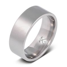 a silver ring with a cross on it