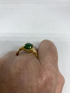 Vintage green nephrite jade Ornate German Silver ring, gold rhodium does not tarnish, NOT sterling Sizes 7, 8 or 9 All rings are shipped in a nice gift box. Check out our over a THOUSAND great reviews Engraving is $4 per letter and is not always perfect depending on the piece. It can take a few days if the jeweler is busy. This is payable to Paypal Judithsltd@gmail.com Formal Gold Jade Rings, Gold Jade Ring With Polished Finish, Formal Jade Rings For May Birthstone, Jade Ring For Anniversary, May Birthstone, Lucky Green, Nephrite Jade, Jade Ring, German Silver, Earrings Photo