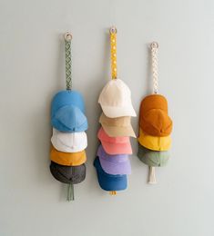 Welcome to the perfect solution for organizing your beloved cap collection! Our Wall Cap Holder, also known as the Cowboy Hat Rack or Baseball Cap Display, offers a stylish and practical storage solution. Ideal for Snapback Caps, Trucker Hats, and more, it's a thoughtful Father's Day gift or addition to any hat lover's space. This Wall Cap Holder is handcrafted/ hand woven with Eco-Friendly Pure Cotton Cord. DETAIL: - Length (without hat):  + 3 hats: 28" ~ 70cm      + 4 hats: 32" ~ 80cm       + Baseball Cap Display, Macrame Hat Holder, Organize Baseball Hats, Baseball Theme Room, Baseball Cap Rack, Macrame Hat, Cowboy Hat Rack, Cap Rack, Cap Organizer