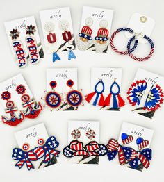 "Adorable red white + blue earrings. So FUN + Patriotic for summer! AMERICA: 3\"L USA: 3.25\"L Uncle Sam: 2.75\"L Hoops: 2.25\" Diameter Anchors: 3\"L Wheels: 2.25\"L Tassels: 2.5\"L Wings: 2.25\"L Beaded Bow: 2.25\"L Cowgirl Hats: 2\"L Pearl Bows: 2.5\"L" Summer America, 4th Of July Jewelry, 4th Of July Earrings, Shadow Realm, America Freedom, Patriotic Accessories, Beaded Bow, Holiday Earrings, Usa Patriotic