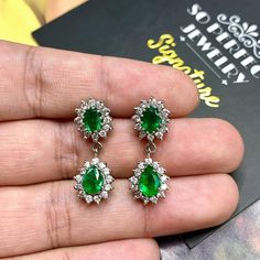 ONE OF A KIND HANDCRAFTED EARRINGS. IN STOCK! READY FOR SHIPPING! GIFT WRAP AVAILABLE! FREE UPS EXPRESS! STUNNING 5.32TCW, Certified Zambian Emerald earrings. UNIQUE DESIGN! ONE OF A KIND! LUXURIOUS, LARGE, SPARKLING EMERALDS IN PAIR! Extremely rare! Surrounded by TOP GRADE, F/VS DIAMONDS! Set in 18K solid white gold earrings. These earrings will absolutely dazzle anyone who sees them! Our jewelry are specially designed, and are delicately handcrafted by local, professional goldsmiths, who have Gia Certified Dangle Earrings, Gia Certified Silver Dangle Earrings, Teardrop Chandelier Earrings With Prong Setting As Gift, Gia Certified Pear-shaped Sterling Silver Earrings, Gia Certified Sterling Silver Teardrop Earrings, Gia Certified Teardrop Sterling Silver Earrings, Gia Certified White Gold Teardrop Earrings, Emerald Diamond Earrings, White Gold Earrings Studs