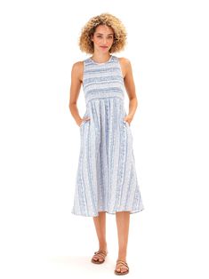 Experience ultimate comfort and style with our Adrienne Gauze Smocked Midi Dress. Made from 100% organic cotton gauze, this dress features a smocked fitted top for a flattering fit. The midi length allows for easy movement, while the breathable and stretchy fabric adds to the overall comfort. Also, it has pockets! Smocked Linen Dress For Vacation, Vacation Linen Dress With Smocked Bodice, Linen Vacation Dress With Smocked Bodice, Beach Linen Dress With Smocked Bodice, Linen Smocked Dress For Vacation, Summer Linen Smocked Dress, Summer Linen Smocked Dress With Smocked Back, Beach Sundress With Smocked Back In Linen, Flowy Cotton Smocked Midi Dress