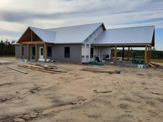 a house under construction in the middle of nowhere