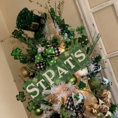 a st patrick's day tree with green and gold decorations