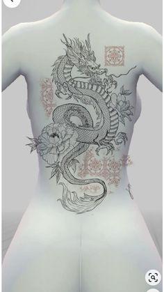 the back of a woman's body with tattoos on her chest and dragon tattoo