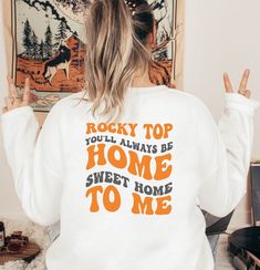 Tennessee Sweatshirt, Vols Hoodie, College Crewneck, Tennessee Football Sweater, Rocky Top Home Sweet Home Sweatshirt and Hoodie WELCOME TO "StyleDesignUS" High quality and super soft, comfortable Sweatshirt and Hoodies. Made with top of the line vinyl and pressed with a professional grade heat press. SIZING AND COLORS Make sure you check our size-chart before you place your order. If you are not sure about sizing please measure your favorite Sweatshirt or Hoodie and compare measurements to the Tennessee Sweatshirt, Customized Mugs, College Crewneck, Super Tired, Tennessee Football, Football Sweater, Rocky Top, Custom Sweatshirts, Super Mom