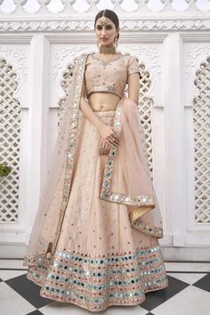 Heavy Designer Lehenga Choli In Fancy Color Fabricated On Heavy Silk Beautified With Heavy Attractive Embroidery And Real Mirror Work & Net Dupatta.Wedding Dress. Product Features:  Lehenga Color: Peach Blouse Color: Peach Dupatta Color: Peach Lehenga Fabric: Heavy Silk Blouse Fabric: Heavy Silk Dupatta Fabric: Net Style Name: Flared Work: Sequance, Hand Embroidery, Real Mirror Work Occasion: Festive Size: Customised Upto 42" Wash Care: Dry Clean Disclaimer: There will be slight difference i Sequins Lehenga, Sequence Lehenga, Latest Lehenga Designs, Peach Lehenga, Mirror Work Lehenga, Season Outfits, Indian Lehenga Choli, Peach Blouse, Lehenga Online