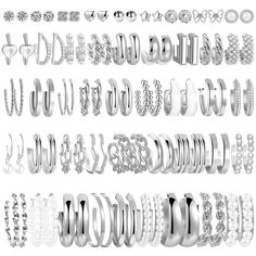 many different types of rings and bracelets on a white background with clipping path