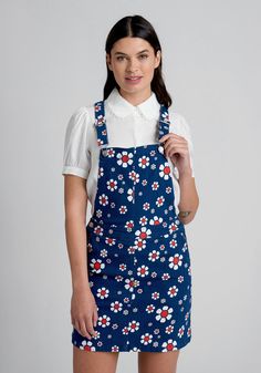 It’s bloom season, and this navy blue skirtall from our ModCloth namesake label is flourishing in white daisies with red and yellow centers scattered all over! Made from a stretchy denim fabric, this adorable overall skirt boasts adjustable shoulder straps with classic overall hardware at the bib and button-up hip closure. Featuring front slash pockets and a playful A-line silhouette, this cheerful suspender skirt will be such a joy to mix- and-match with your collection of favorite t-shirts. Overall Skirt, Tunic Hoodie, White Daisies, Plus Size Outerwear, Suspender Skirt