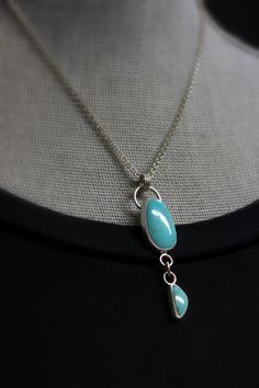 "READY TO SHIP. Two high quality Kingman turquoise teardrops(Arizona mine) set in custom .999 fine silver/.925 sterling silver, suspended from a sterling chain and medium spring clasp. This necklace has a brushed/matte finish. *Each jewelry is made by hand- formed, forged, set and polished. Details * Necklace Length: 15\",16\",18\".20\" * Pendant(Total drop including bail): 2.5\" * Kingman Turquoise: 24mm x 13mm & 14 x 5.8mm * .999 Fine Silver; .925 Sterling Silver * Handmade It comes beauti Silver Threader Earrings, Dangle Necklace, Detailed Necklace, Dangle Necklaces, Skull Jewelry, White Turquoise, Necklace White, Kingman Turquoise, Statement Pendant