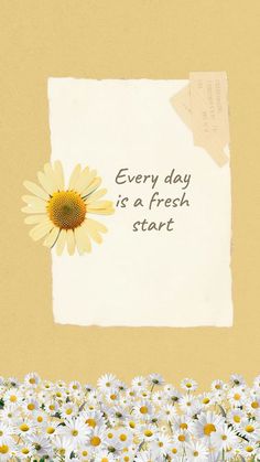 a card with daisies and a piece of paper that says every day is a fresh start