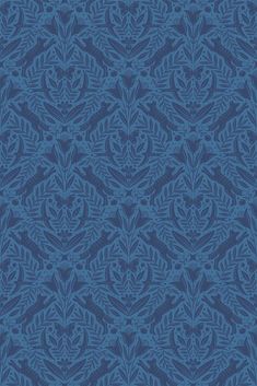 a blue wallpaper with leaves on it