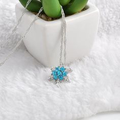 Specification:Gender: WomanColor: Sky Blue , Sea BlueMaterial: Zinc Alloy, Zircon, CrystalThickness: 0.5cm (0.19")Length: 23cm + 5 (extend chain )Pendant Diameter: 2cm ( 0.78")Net Weight: 6gOccasion: Party, Birthday, Anniversary, Gift, Daily Wearing etc.Package includes: 1pcs x Necklace Notes:1. Please note the photo does not show actual size, please refer to Description for size details. 2. Please allowed 1-5mm differences due to manual measurement, thanks.3. Due to the difference between diffe Blue Crystal Necklace, Snowflake Necklace, Crystal Snowflakes, Snowflake Pendant, Vintage Lady, Vintage Necklaces, Jewelry Christmas, Crystal Necklace Pendant, Crystal Flower