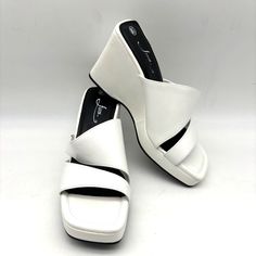 Vintage 90s Y2k Fioni White Faux Leather Chunky Platform Slip On Sandals 4" Heel 1" Platform Women's Size Us 8.5 Uk 7 Eu 40.5 Vintage, Brand New, Never Worn Condition Without Original Tags Or Box. Have Been Tried On. Some Sticker Residue On Right Insole. Clean And From A Smoke Free Home. Retro White Synthetic Heels, White Retro Synthetic Heels, White Retro Heels For Summer, White Retro Summer Heels, Retro White Open Toe Heels, Trendy White Leather Wedge Sandals, Retro White Heels Medium Width, White Retro Heels Medium Width, Casual White Heels In Faux Leather