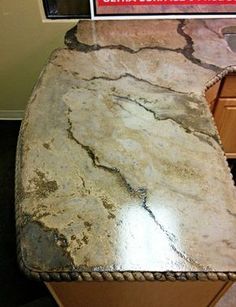 a counter top that has some kind of stone on it with the words amazing diy concrete countertops