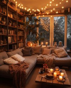 a living room filled with lots of furniture and candles