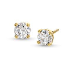 These stunning certified lab-created diamond solitaire stud earrings are a timeless and elegant choice. Crafted in 14K gold. Set with 1-1/2 ct. t.w. of certified lab-created diamonds. I colour/SI2 clarity. Earrings secure with screw backs. Includes certification card. Classic 14k Gold Diamond Earrings With Prong Setting, Classic Yellow Gold Diamond Earrings With Prong Setting, Gold Round Cut Lab Grown Diamond Earrings, Classic Gold Moissanite Diamond Earrings, Gold Lab Grown Diamond Round Cut Earrings, Gold Lab Grown Diamond Earrings Round Cut, Gold Lab-grown Diamond Round Cut Earrings, 14k Yellow Gold Solitaire Earrings, Gold Solitaire Diamond Earrings Fine Jewelry