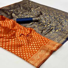 Orange colored saree is made from banarasi silk fabric which is highlighted with beautiful weaving work as shown. comes along unstitched banarasi silk blouse which you can customise as per your design/style. Occasion - You can wear this saree for festive and functions. Note:- The actual product may differ slightly in color and design from the one illustrated in the images when compared with computer or mobile screen. Measurements: Saree : Banarasi Silk : 5.5 Mtrs Blouse : Banarasi Silk : 0.8 Mtr Orange Unstitched Katan Silk Blouse Piece, Orange Katan Silk Saree For Diwali, Orange Banarasi Silk Handloom Blouse Piece, Orange Art Silk Blouse Piece With Zari Weaving, Orange Katan Silk Blouse Piece With Pallu, Orange Katan Silk Saree With Pallu, Orange Katan Silk Saree With Pallu Detail, Orange Katan Silk Traditional Wear With Unstitched Blouse, Orange Art Silk Saree With Zari Weaving