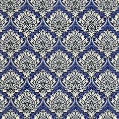 a blue and white wallpaper with an ornate design