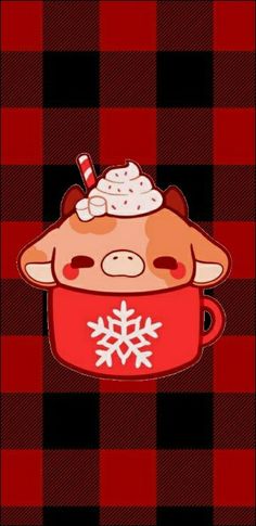 a red and black checkered background with a cow in a cup filled with whipped cream