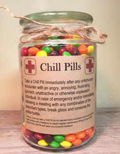 a jar filled with lots of colorful candy