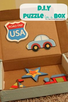 an open cardboard box with some magnets in it and the words road trip usa