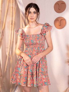 Just like the breeze, this fun short ruffle mini dress is a breath of fresh air. Crafted from 100% cotton cambric, it's as light and airy as a summer day. The floral jaal hand block print dances across the fabric, adding a touch of whimsy to its peach nectar hue. With its easy-to-wear fit & flare silhouette and charming balloon sleeves, this peach mini dress is perfect for casual occasions. Complete with a center-back zip closure and two pockets for practicality, it effortlessly combines style a Peach Nectar, Cotton Short Dresses, Frock For Women, Desi Fashion Casual, Fashion Top Outfits, Ruffle Sleeve Dress, Easy Trendy Outfits, Short Dresses Casual, Ruffle Mini Dress