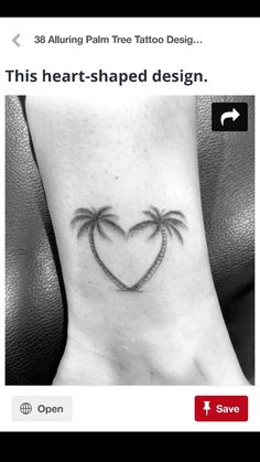 a heart shaped tattoo with two palm trees on the side of the foot, and an open caption below