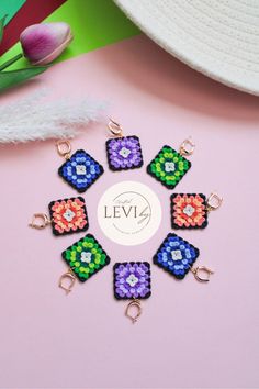 Inspired by our black granny square dangle earrings, this time CBL is coming up with the 'short' version ranging from not one not two, but FOUR color to choose from! Even though it's only 1-tier, but it sure does make a statement earring. Available in four colors: 💙 Blue 💜 Purple 🧡 Orange 💚 Green Drop length: 1.75 inches (approximately) Using 18K gold plated semi hoop Due to the handmade nature of our products, there may be slight variations in color and/or craftsmanship. © Crafted by Levi. Handmade Multicolor Square Earrings, Square Multicolor Earrings For Gift, Handmade Square Earrings For Gift, Black Granny Square, Handmade Gifts For Her, Statement Earring, Free Jewelry, Granny Square, Clay Earrings