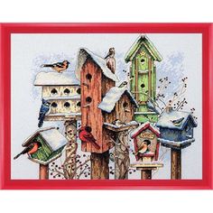 a cross stitch picture with birds and birdhouses on it's side, in the snow