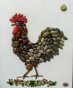 a rooster made out of rocks and stones