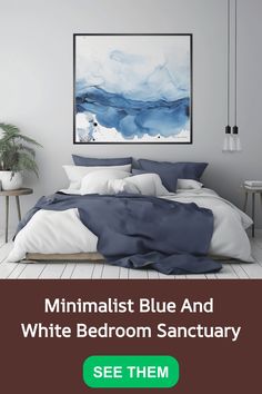 Minimalist bedroom with white walls, blue and white bedding, abstract blue painting above the bed, and modern decor.