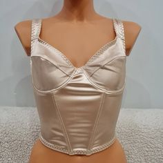 Handmade corset in beige colour, side bones, hooks on back, Satin fabric, beige satin Different sizes are available. Can be a perfect gift or just a nice treat, anyway the woman who will get it will be impressed. It handmade matching style - body. Condition: 100% New Material: Caprone Size: Available in different sizes. All sizes are EU. Please do not hesitate to contact me if you need any more information. Thanks for visiting my shop. MissN Party Corset With Built-in Bra In Beige, Beige Sleeveless Corset With Built-in Bra, Sleeveless Satin Corset With Built-in Bra, Fitted Underbust Beige Corset, Beige Fitted Underbust Corset, Elegant Beige Corset For Night Out, Beige Fitted Corset With Built-in Bra, Sleeveless Beige Corset With Corset Back, Beige Underbust Corset For Party