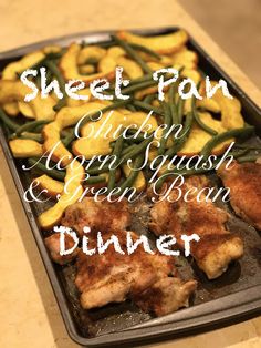 a pan filled with chicken, green beans and dinner