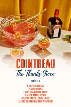 an advertisement for contreau the thanks given served on a table with oranges