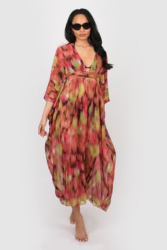 A great kaftan for on holiday over swimwear but looks just as good worn over leggings/shorts and a vest top for garden parties and days in the park. It has a v neck with a cut out on the front and a band that threads through and ties around the body the inside for a flattering shape. Made from a floaty chiffon fabric that falls beautifully around the body. FABRIC: * Man made * Deadstock fabric * Low crease * Light weight SIZING: * One size will fit between 8-16 UK * Model is 5ft 9in and wears th Multicolor V-neck Beach Dress For Day Out, Flowy V-neck Festival Cover-up, Multicolor V-neck Beach Dress, V-neck Beachwear Cover-up For Day Out, Bohemian V-neck Kaftan For Spring, Casual V-neck Festival Cover-up, Chic V-neck Beach Dress For Holiday, Printed V-neck Beach Dress For Summer, V-neck Kaftan For Vacation