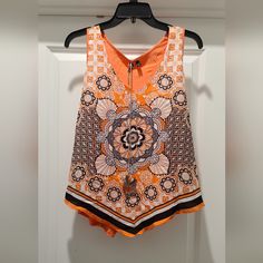 Women's Sleeves Shirt Never Worn Size Xl Orange Sleeveless Summer Vest, Orange Sleeveless Vest For Summer, Orange Summer Vest, Orange Vest Top For Spring, Orange V-neck Tank Top For Summer, Orange Sleeveless Tank Top For Spring, Orange Sleeveless Top For Spring, Summer Orange Sleeveless Blouse, Orange Sleeveless Blouse For Summer