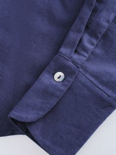 Introducing our Linen Blouse-Navy. Perfect for both casual and formal occasions, this blouse provides a sophisticated and polished look. Indigo Shirt For Workwear In Fall, Elegant Navy Cotton Shirt, Blue Semi-formal Tops For Fall, Classic Formal Tops With Pockets, Long Sleeve Navy Blouse For Fall, Navy Long Sleeve Blouse For Fall, Navy Fitted Collared Tops, Navy Cotton Tops For Semi-formal Occasions, Navy Cotton Top For Semi-formal Occasions