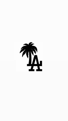 a black and white photo of a palm tree with the letter a in it's center