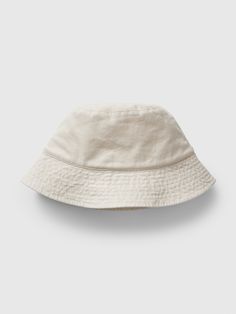 Smooth linen-blend bucket hat.  Flutter brim. Casual Natural Bucket Hat With Flat Brim, Everyday Lightweight Solid Color Sun Hat, Casual Solid Bucket Hat For Spring, Everyday Lightweight Solid Sun Hat, Solid Color Cotton Sun Hat For Everyday, Solid Cotton Sun Hat For Everyday, Lightweight Natural Color Casual Bucket Hat, Everyday Cotton Sun Hat, Casual Cotton Fedora Sun Hat