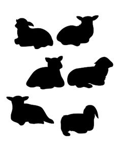 the silhouettes of dogs and rabbits are shown in black against a white background,