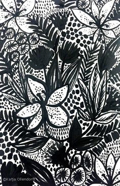 a black and white drawing of flowers on a sheet of paper with dots in the background