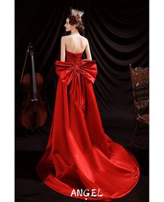 Buy sweetheart high low red satin formal dress with big bow in back at wholesale price online. Free shipping and pro custom service since 2009. 1950s Dress Formal, Red Glitter Dress, Dress With Big Bow, Red Bow Dress, Red Formal Gown, Big Bow Dress, Matric Dance Dresses, Elegant Red Dress, Satin Formal Dress