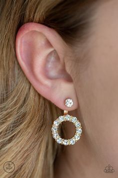 A solitaire white rhinestone attaches to a double-sided post, designed to fasten behind the ear. Encrusted in a ring of glassy white rhinestones, the glittery hoop peeks out beneath the ear for a glamorous look. Earring attaches to a standard post fitting. Gold Rhinestone Earrings, Double Sided Earrings, Glamorous Look, Jewelry Earring, Ball Necklace, Paparazzi Accessories, Trendy Earrings, White Rhinestone, Gold Rhinestone